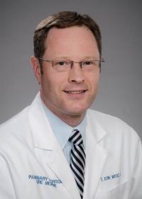 Dr. T. Eoin West